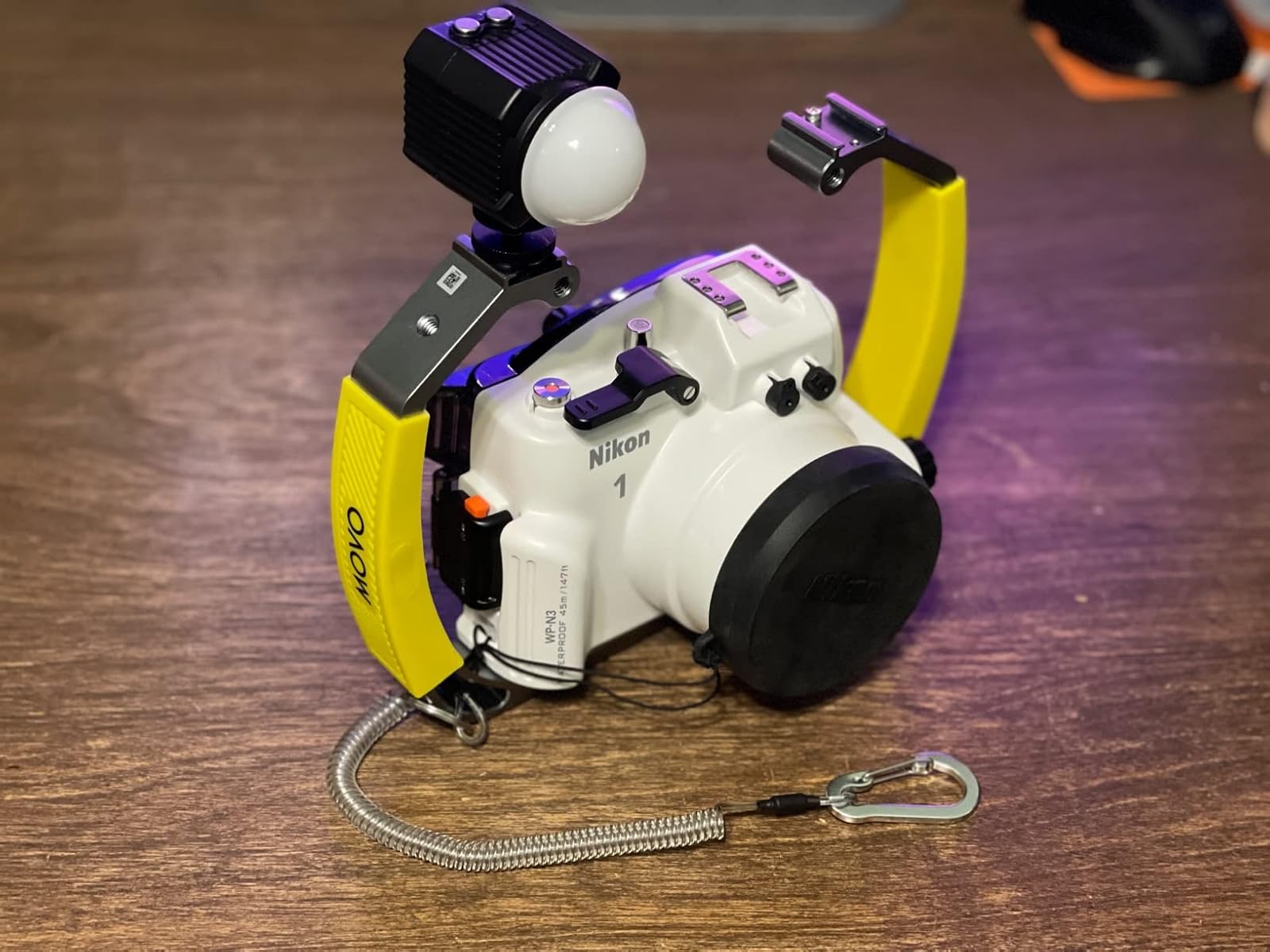 Tiny. submersible. Bright. Long lasting. Diffuser is a nice bonus. Photo taken with GoPros for scale.